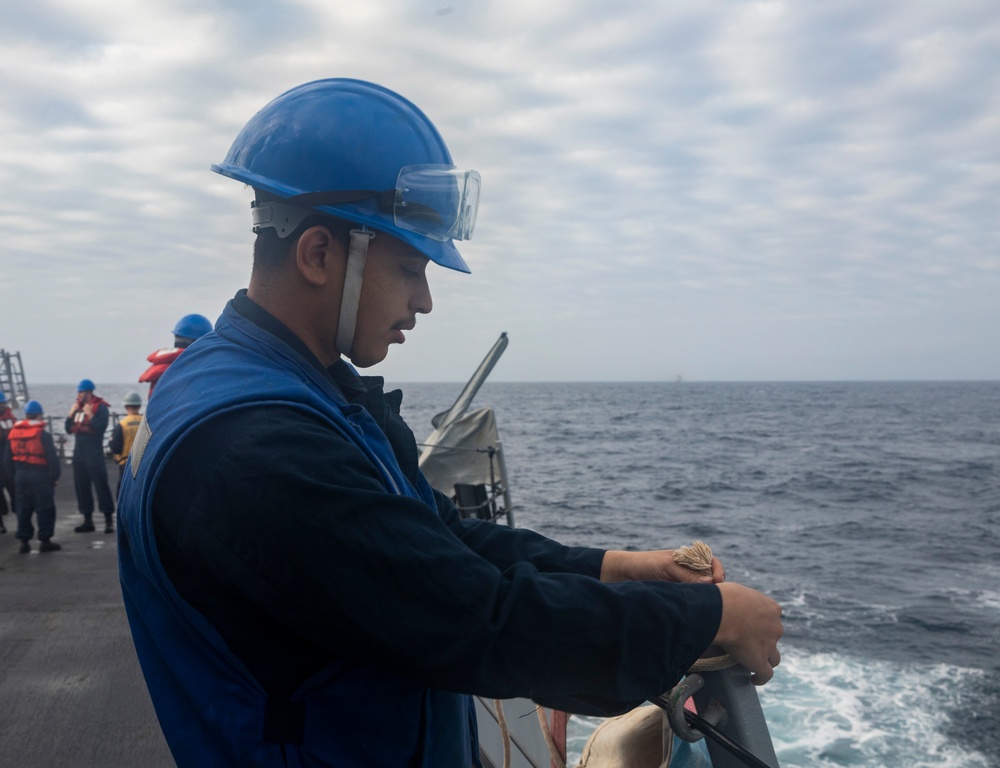 Sailors Aboard USS Ralph Johnson (DDG 114) Conduct Replenishment-at-Sea