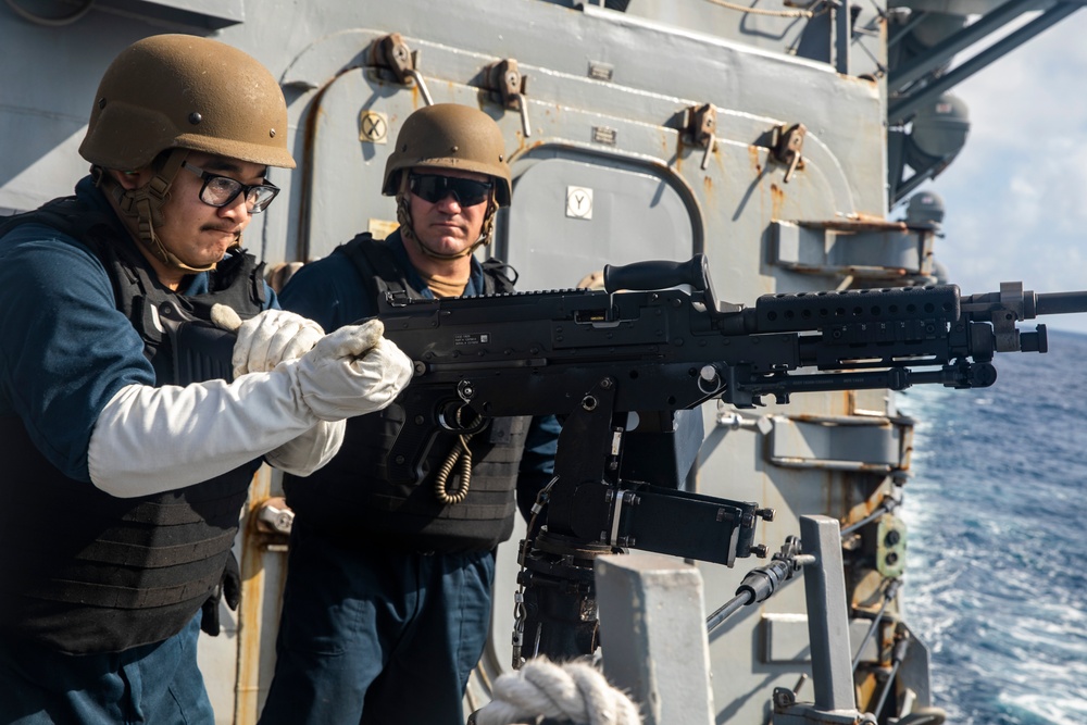 Sailors Aboard USS Ralph Johnson (DDG 114) Conduct Live-Fire Exercise