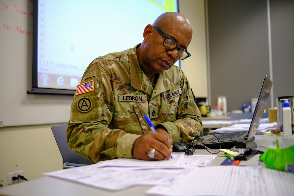 Soldiers prepare COVID-19 boxes for distribution