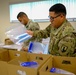 Soldiers prepare COVID-19 boxes for distribution
