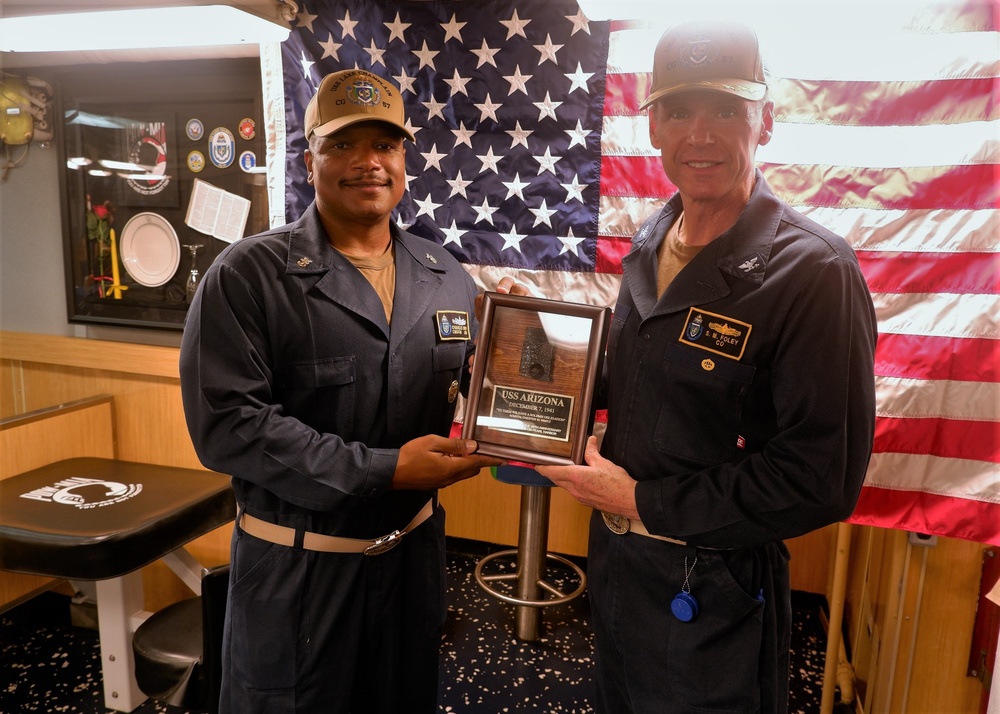 USS Lake Champlain receives relic from USS Arizona