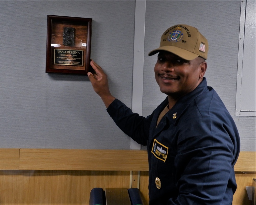 USS Lake Champlain receives relic from USS Arizona