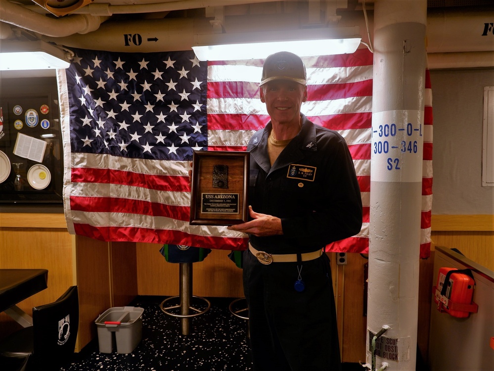 USS Lake Champlain receives relic from USS Arizona