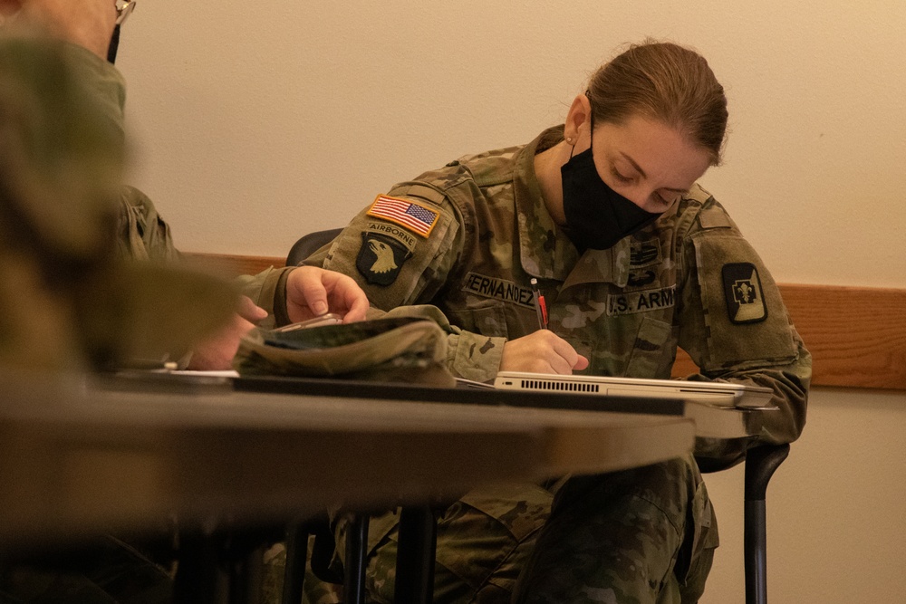 Military medical team receives a JRSOI brief at local Shiprock hospital