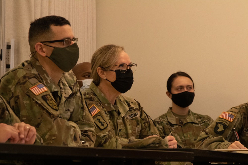 Military medical team receives a JRSOI brief at local Shiprock hospital