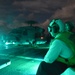 USS Lake Champlain conducts night flight operations in the Philippine Sea