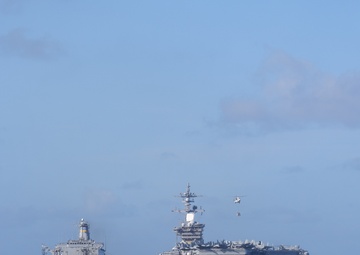 USS Lake Champlain conducts replenishment-at-sea operations in the Philippine Sea