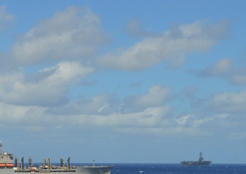 USS Lake Champlain conducts replenishment-at-sea operations in the Philippine Sea