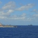 USS Lake Champlain conducts replenishment-at-sea operations in the Philippine Sea