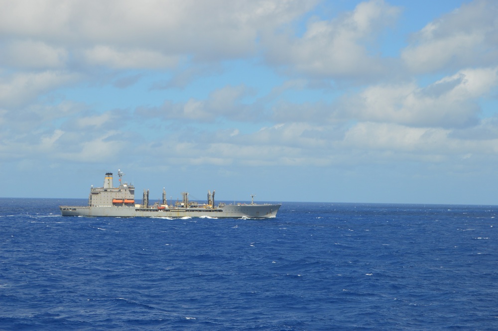 USS Lake Champlain conducts replenishment-at-sea operations in the Philippine Sea