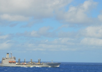 USS Lake Champlain conducts replenishment-at-sea operations in the Philippine Sea