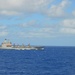 USS Lake Champlain conducts replenishment-at-sea operations in the Philippine Sea