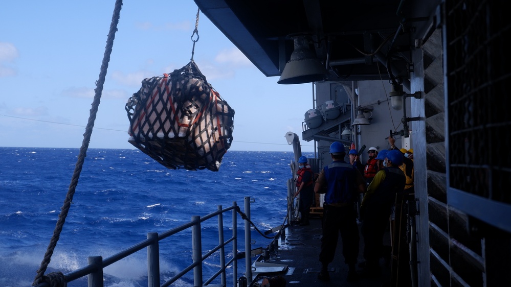 USS Lake Champlain conducts replenishment-at-sea operations in the Philippine Sea