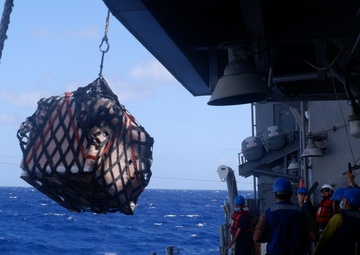 USS Lake Champlain conducts replenishment-at-sea operations in the Philippine Sea
