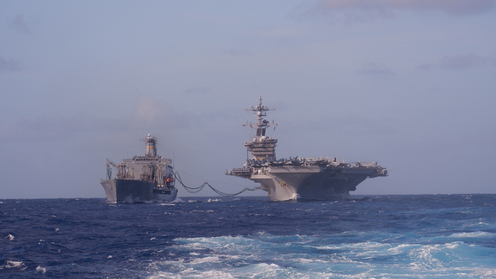 USS Lake Champlain conducts replenishment-at-sea operations in the Philippine Sea