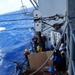 USS Lake Champlain conducts replenishment-at-sea operations in the Philippine Sea