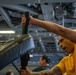 USS Jackson (LCS 6) Sailor Conducts Non Lethal Weapons Training