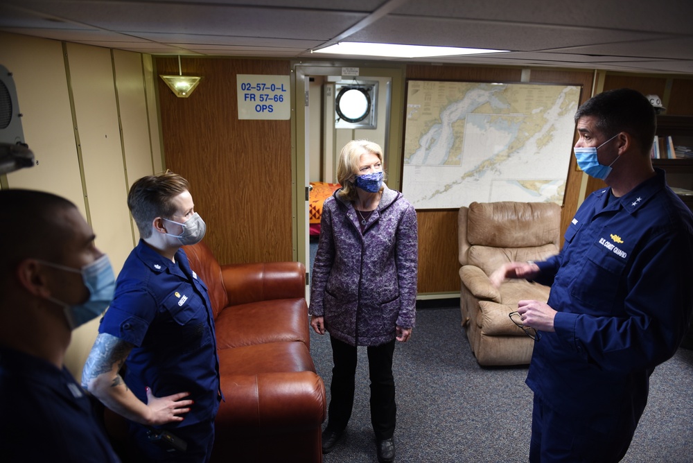 Cmdr. Jeannette Greene, commanding officer of Coast Guard Cutter Hickory, speaks with Rear Adm. Nathan Moore, commander, 17th District, and U.S. Sen. Lisa Murkowski aboard Cutter Hickory in Homer, Alaska, Jan. 26, 2022. Murkowski and Moore visited Coast Guard members aboard the cutter in Homer to listen to their concerns about serving in Alaska. (U.S. Coast Guard photo by Petty Officer 1st Class Nate Littlejohn)