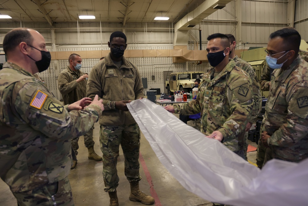 Nuclear Disablement Teams train for sampling mission at 1st Area Medical Laboratory