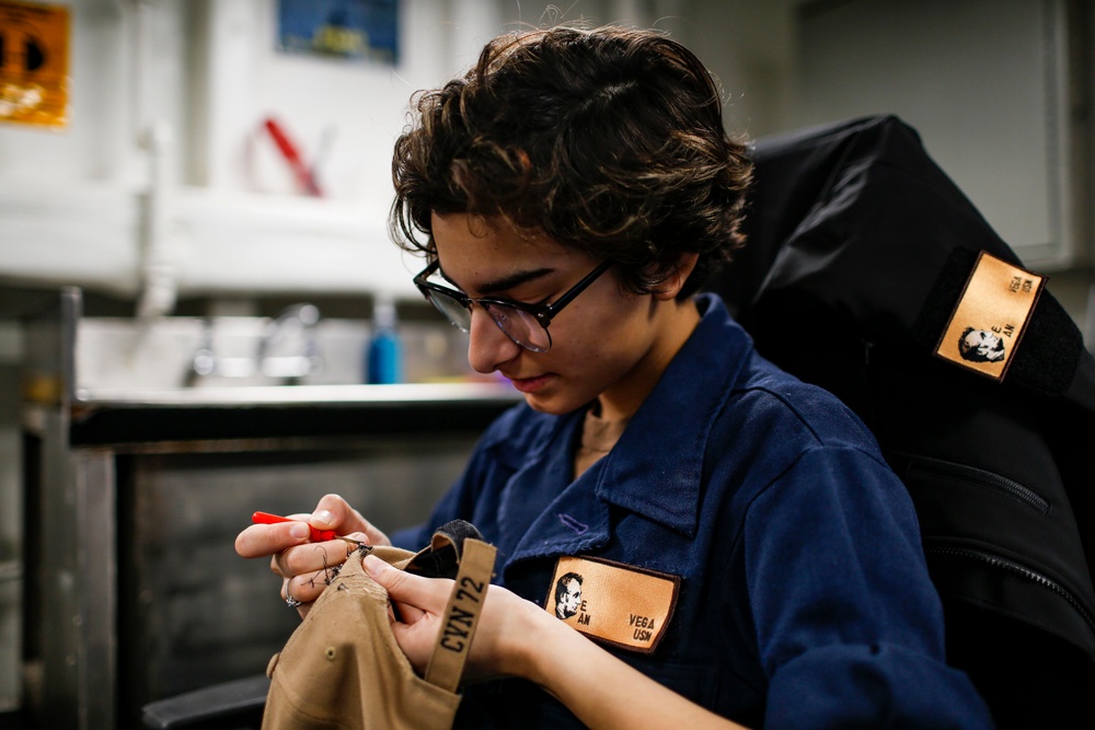 Abraham Lincoln Sailor removes stitching