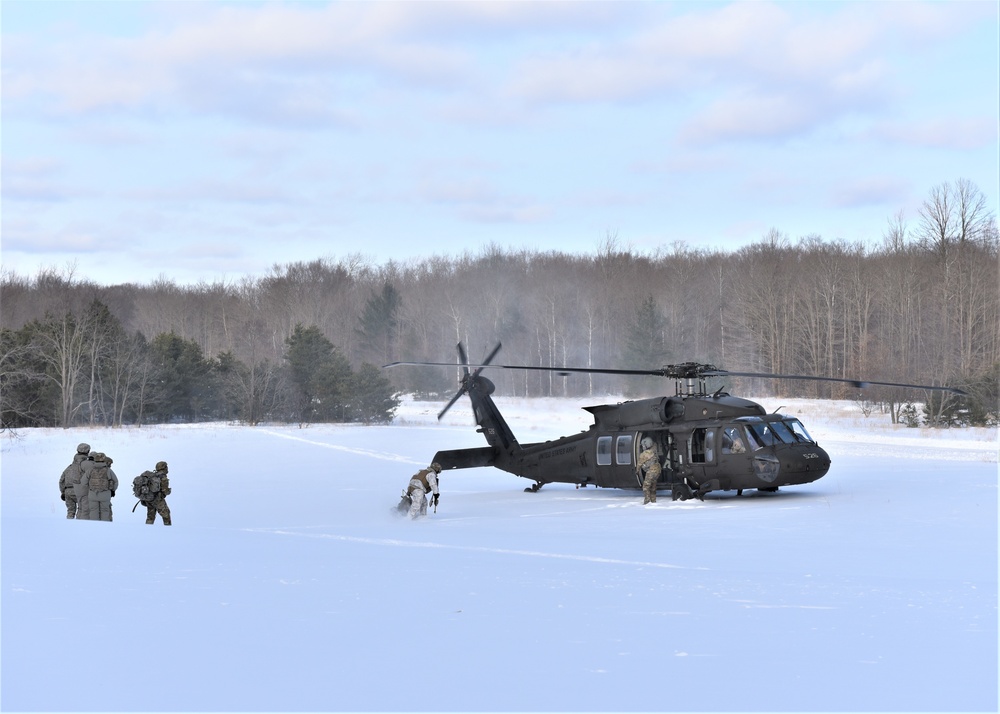 Fire Observers receive an airlift home after a long cold day