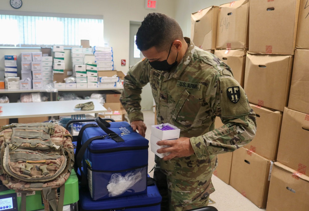 PRNG use Humvee for COVID vaccine distribution