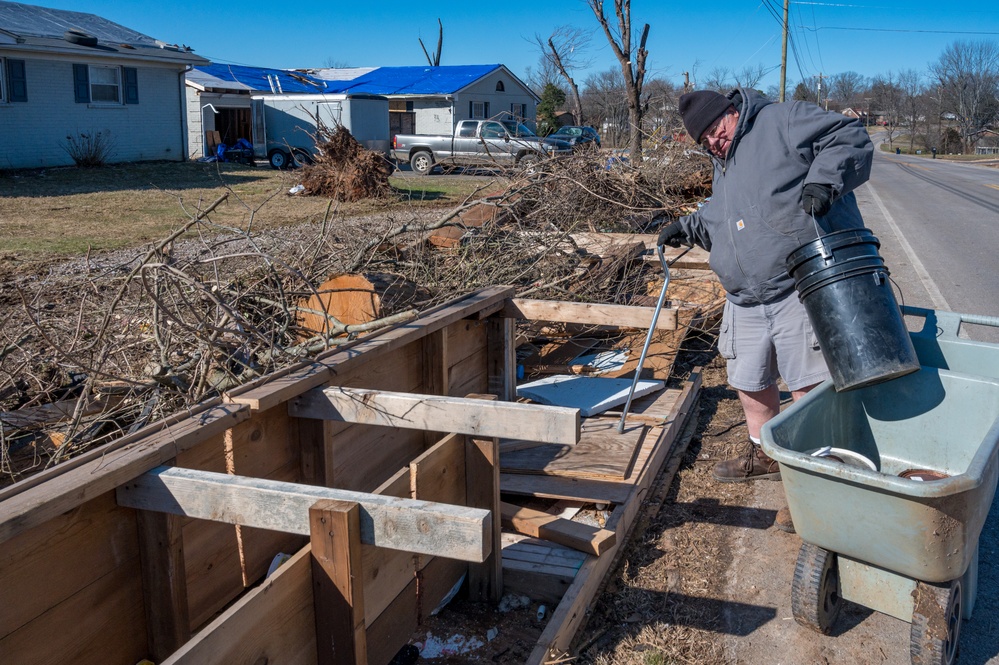 Resident Removes Tornado Debris in Bowing Green, KY