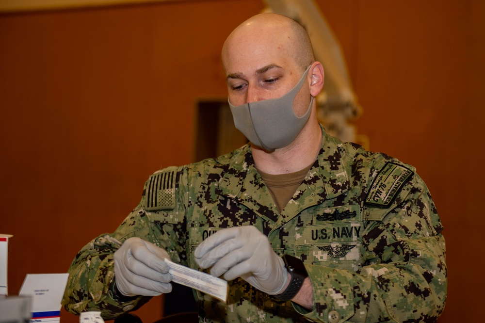 USS Ronald Reagan (CVN 76) Hospital Corpsmen Administer COVID-19 Vaccine Boosters to Base Employees