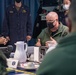 Commodore of Phibron 11 conducs pre-sail conference aboard USS America.