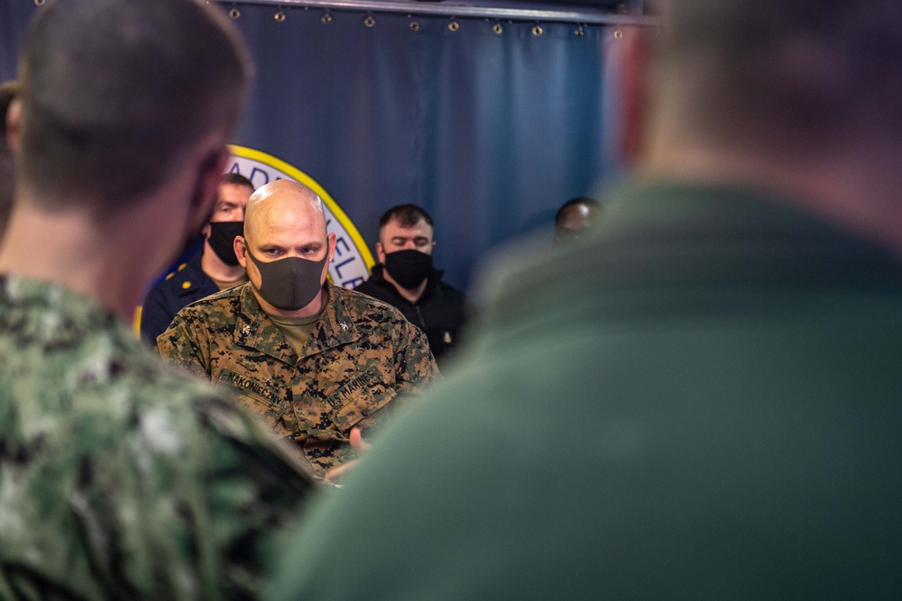 Commodore of Phibron 11 conducts pre-sail conference aboard USS America.