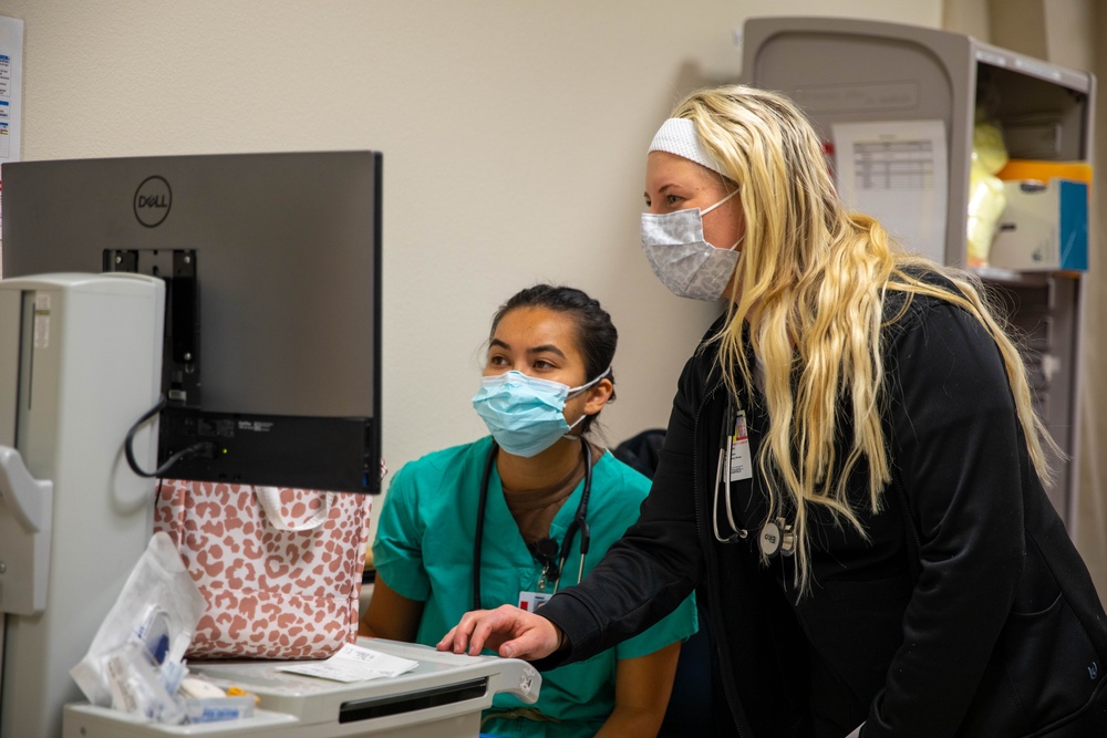 Navy Sailors Work Hand in Hand with Civilian Healthcare Employees