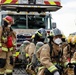 Sailors and Firefighters from USS Barry, USS Howard and CFAY Emergency Services Conduct Integrated Fire Drill