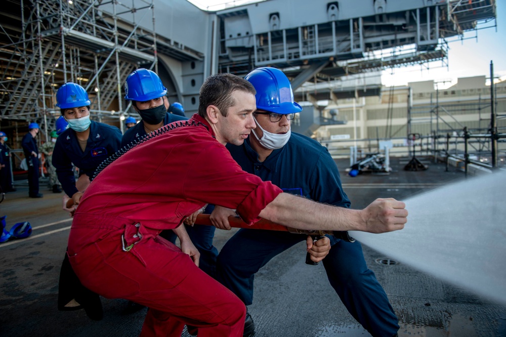 GHWB Sailor of the Year Teaches Hose Handling