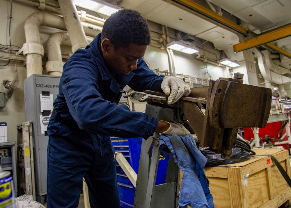 GHWB Sailor Performs Maintenance