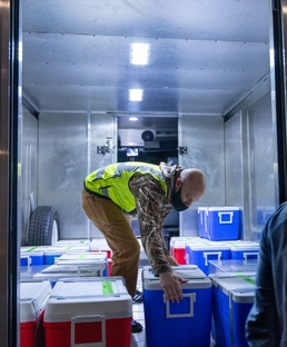 NAVFAC Contractors Prepare Water Samples for Transport to Testing Facilities