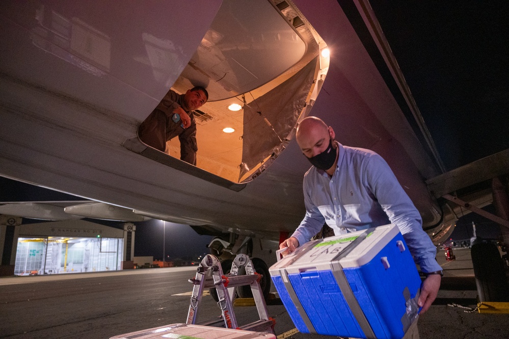 NAVFAC Contractors Prepare Water Samples for Transport to Testing Facilities