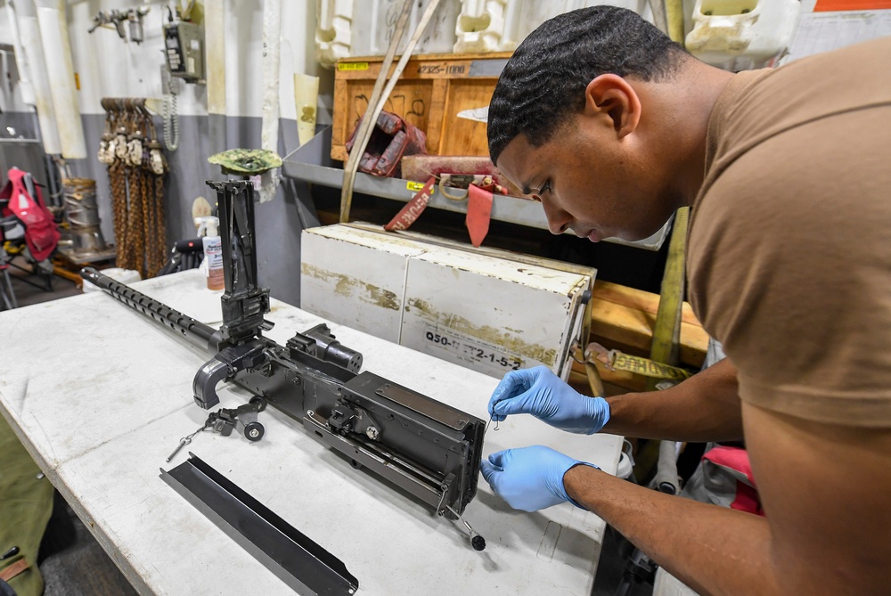 USS Chafee (DDG 90) Sailors Conduct Gun Maintenance