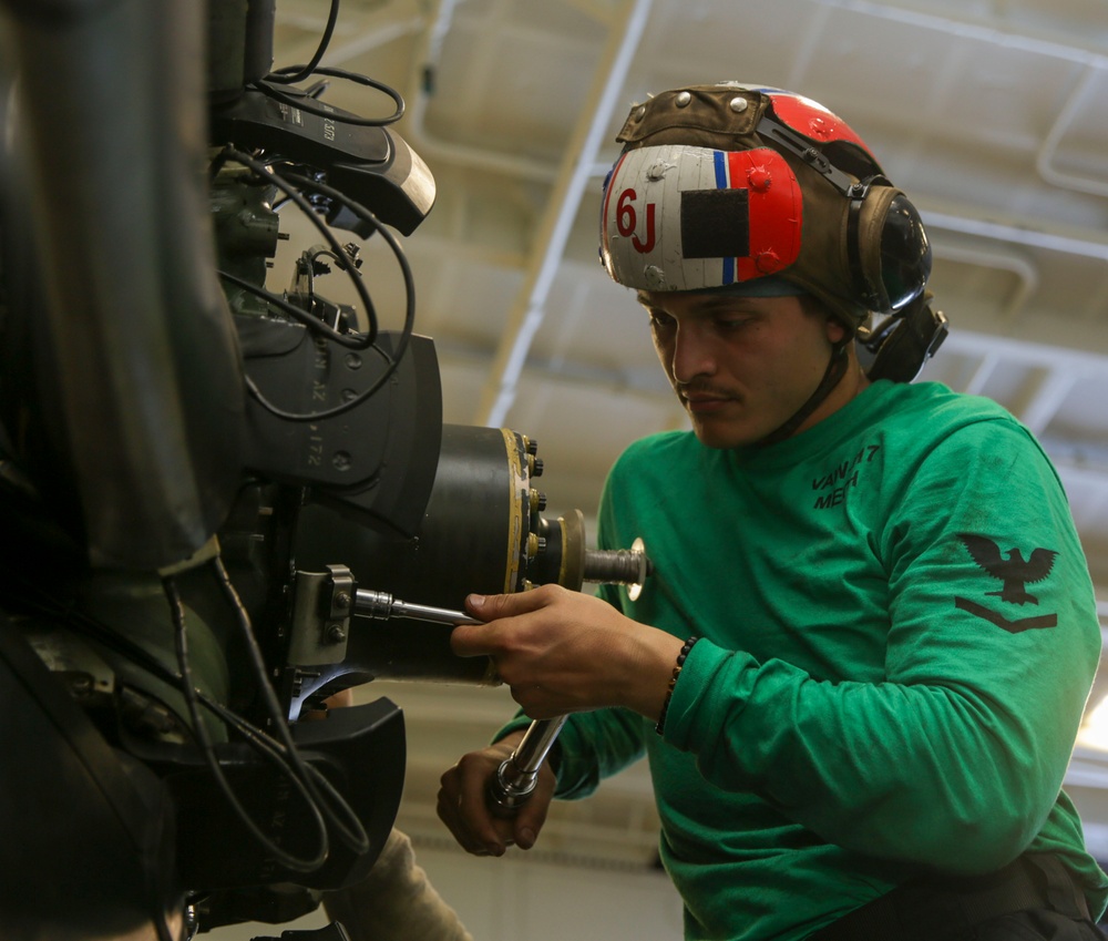 Abraham Lincoln Sailors conduct aircraft maintenance