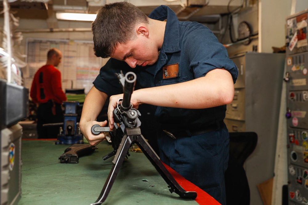 Abraham Lincoln Sailors conduct weapon maintenance