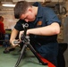 Abraham Lincoln Sailors conduct weapon maintenance