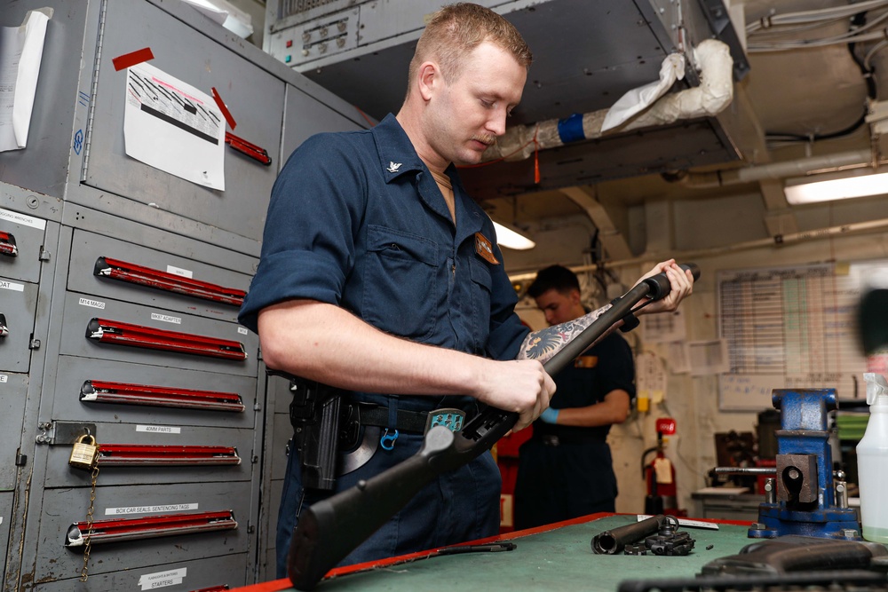 Abraham Lincoln Sailors conduct weapon maintenance