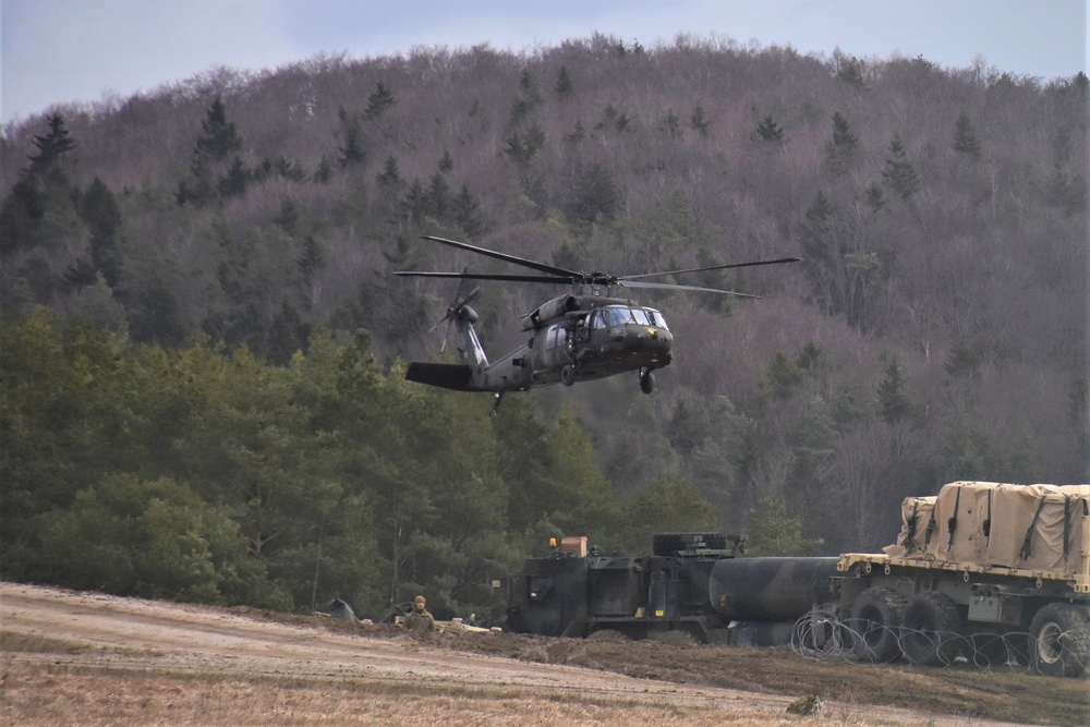 Black Hawks return to airfield after mission at Allied Spirit 22