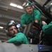 Abraham Lincoln Sailors conduct aircraft maintenance