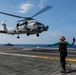 Abraham Lincoln's commanding officer pilots an MH-60R Sea Hawk