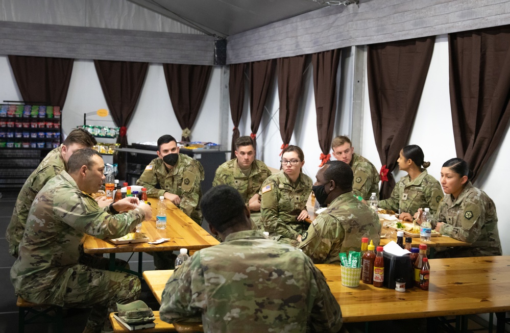 Command Sgt. Maj. Harris talks with junior enlisted Soldiers