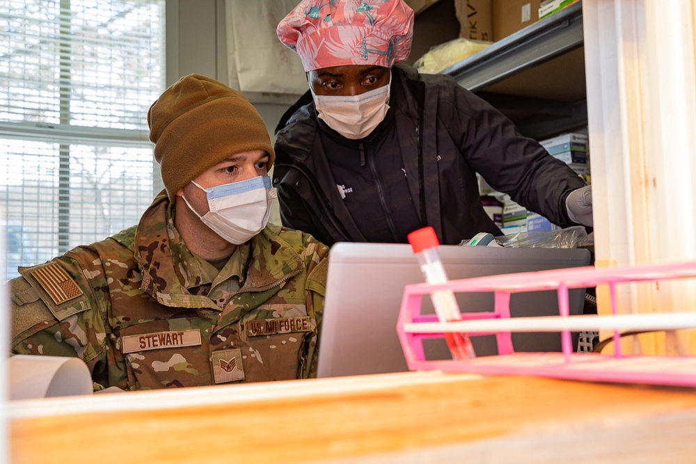 103rd Airlift Wing, Connecticut Air National Guard aids health care workers at COVID-19 test site.
