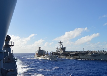 USS Lake Champlain (CG 57) Conducts a Replenishment-At-Sea