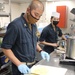 USS Lake Champlain (CG 57) Sailors Prepares Dinner