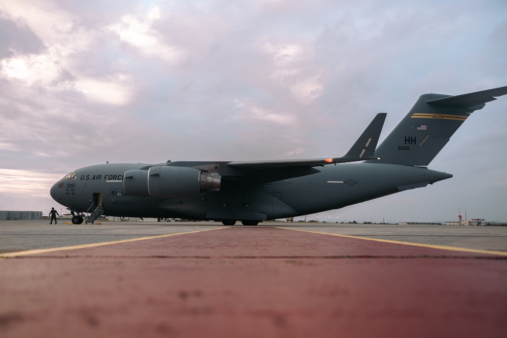 U.S. Air Force C-17 lands on MCAS Futenma to deliver two AH-1Z Viper attack helicopters