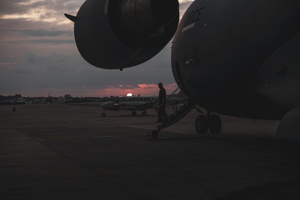 U.S. Air Force C-17 lands on MCAS Futenma to deliver two AH-1Z Viper attack helicopters